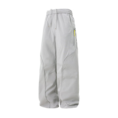 Unisex Weite Nylon-Freizeithose mit Tunnelzug und Reißverschlusstasche Echo Archiv
