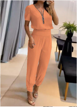 Damen Jumpsuit mit V-Ausschnitt und Gummizug Echoarchiv
