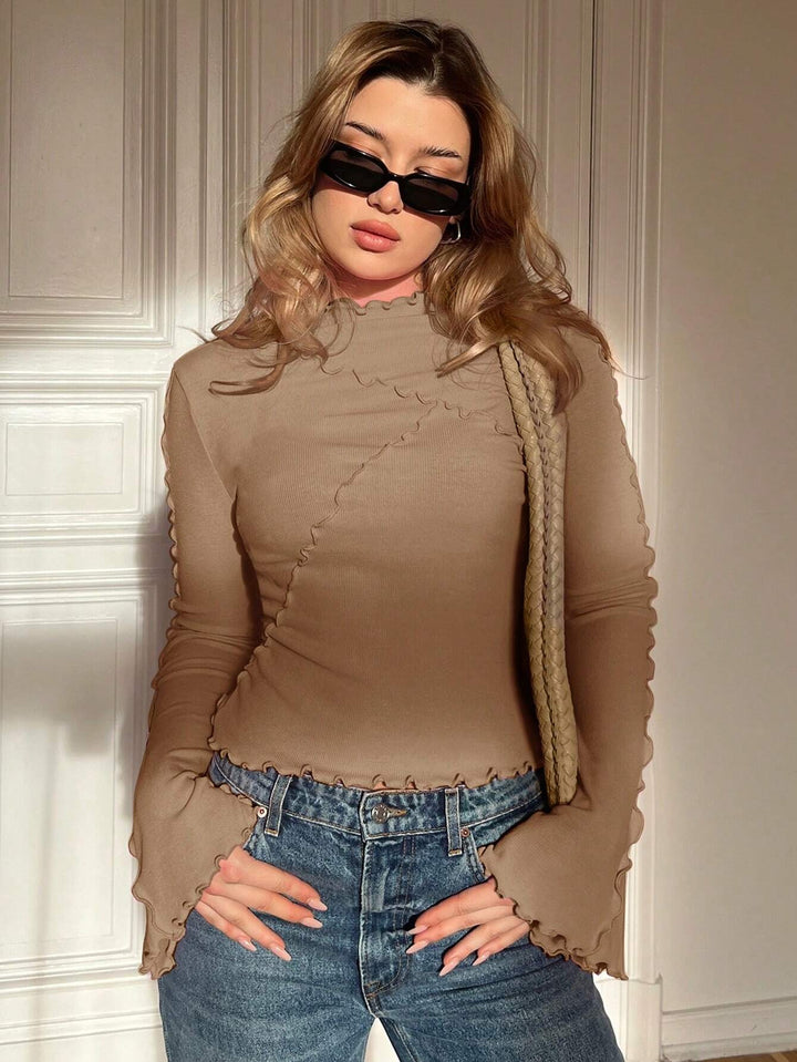 Damen Geripptes Langarmshirt mit Rüschen-Saum und Stehkragen Echo Archiv