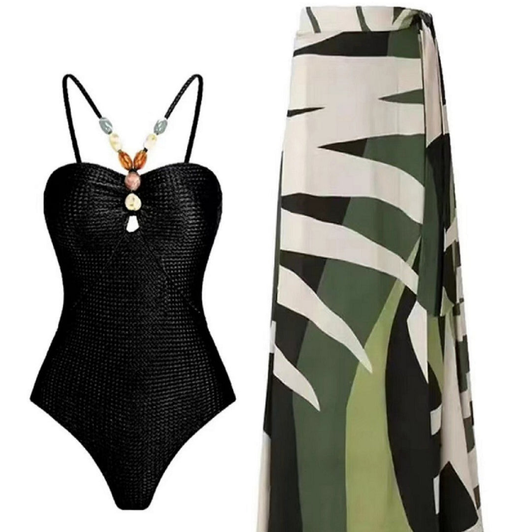 Damen Badeanzug mit elegantem Wickelrock und modischen Schmuckdetails Echo Archiv