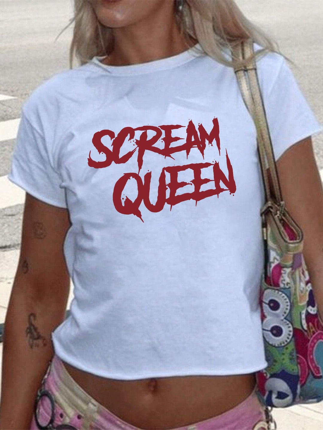 Damen T-Shirt mit funkelndem Discokugel-Motiv und zeitgemäßem Schleifendetail Echo Archiv