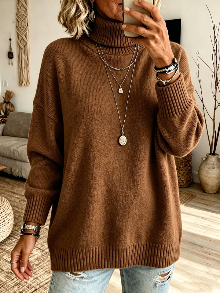 Damen Oversize Rollkragenpullover aus Feinstrick mit gerippten Bündchen und überschnittener Schulter – Mavelle