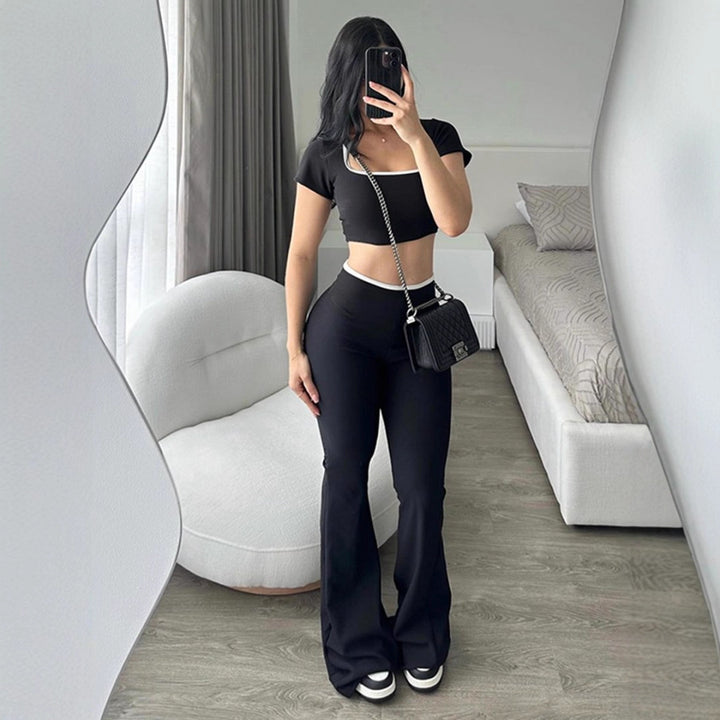 Damen modisches Crop-Top mit tailliertem Schnitt und weiter Hose Echo Archiv