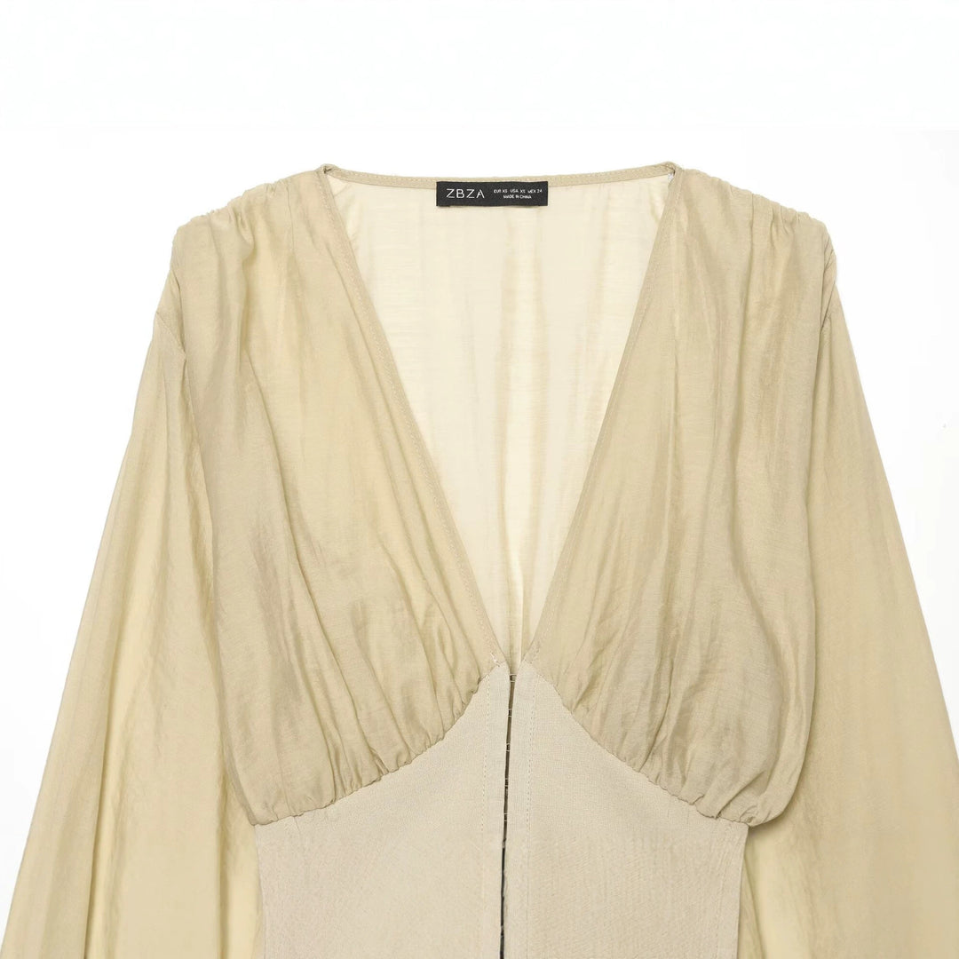 Damen Kurzes Bolero-Blouson mit tiefem V‑Ausschnitt, geraffter Passe und Ballonärmeln Echo Archiv