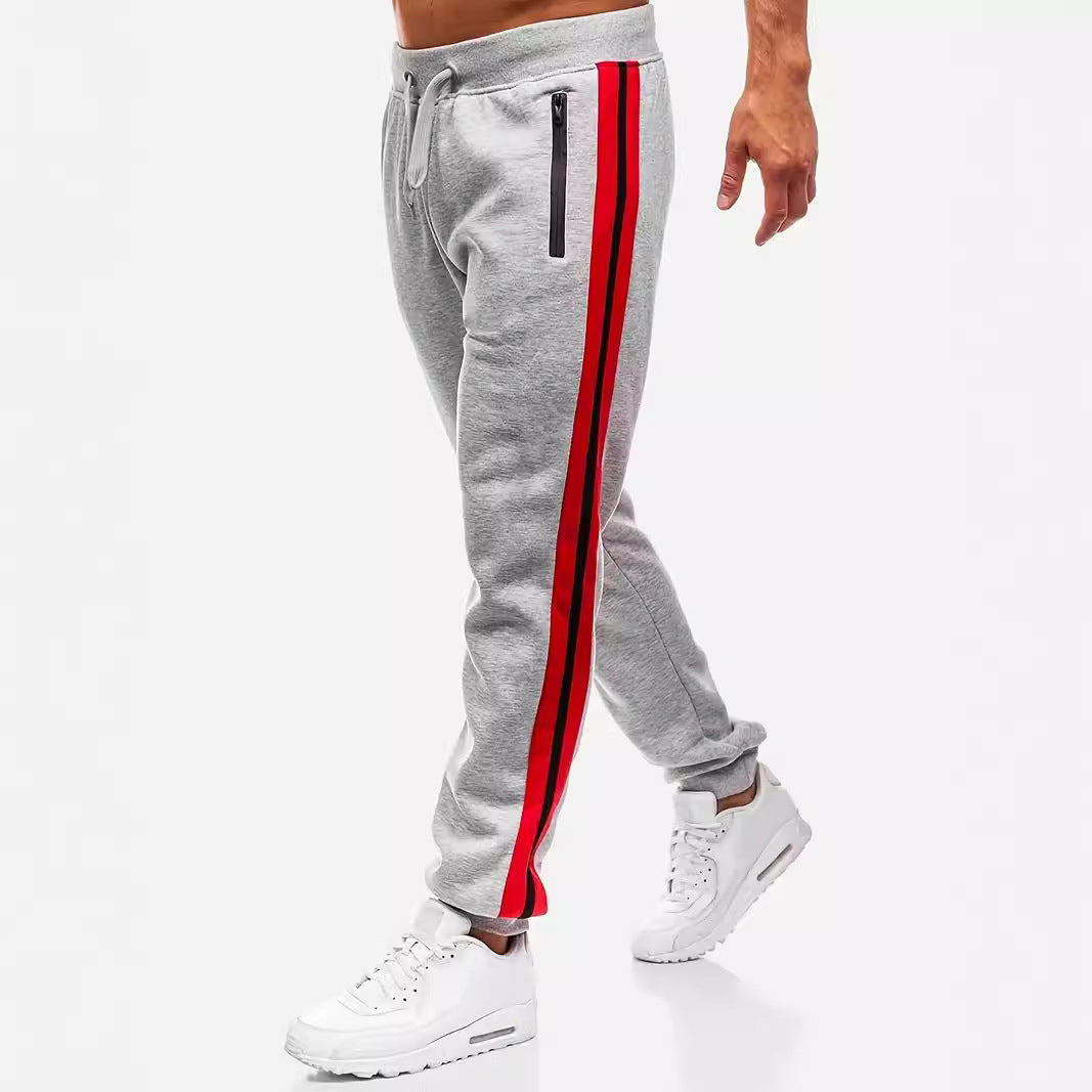 Herren nan schmal zulaufende Fleece-Jogginghose mit zweifarbiger Seitenpaspel und wasserabweisenden Reißverschlusstaschen Echo Archiv