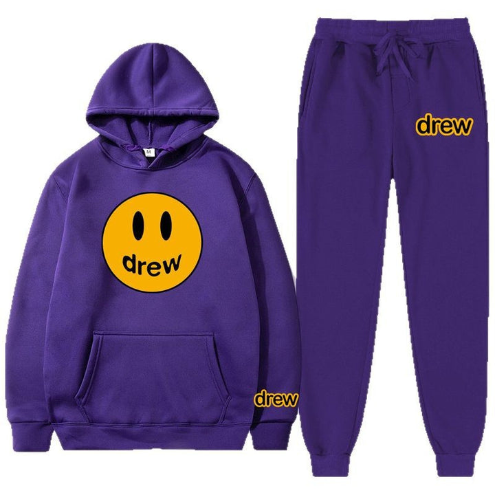 Unisex nan zweiteiliges Lounge-Set aus French-Terry mit Smiley-Print Kapuzenpullover und tapered Jogginghose Echo Archiv