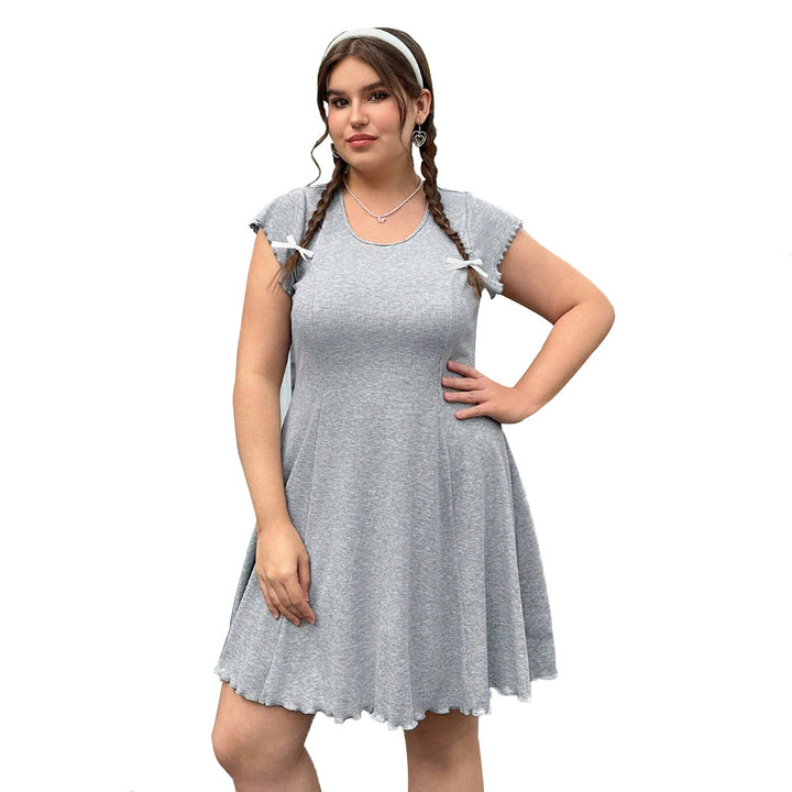 Damen lässiges Jersey-Kleid mit verspielt geschwungenem Saum und dekorativen Bändern Echo Archiv