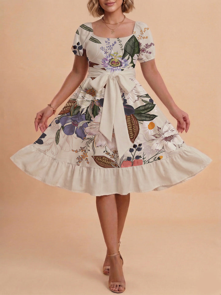 Damen Sommerliches Blumenkleid mit taillierbarem Gürtel und voluminösen Ärmeln Echo Archiv