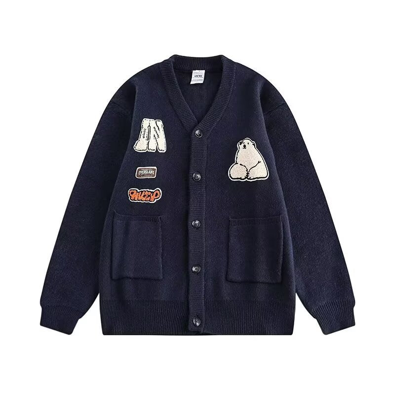Damen Gemütliche Strickjacke mit bunten Applikationen Echoarchiv