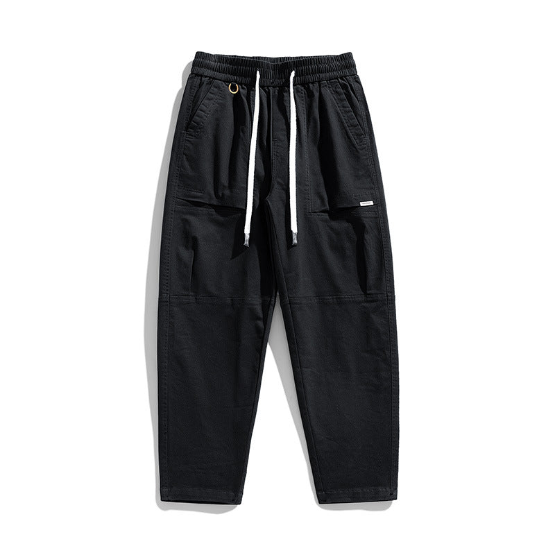 Herren Baggy-Utility-Cargohose im Tapered-Schnitt mit elastischem Tunnelzugbund, aufgesetzten Fronttaschen und Knieabnähern Echo Archiv