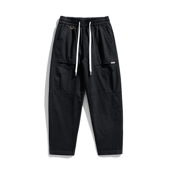 Herren Baggy-Utility-Cargohose im Tapered-Schnitt mit elastischem Tunnelzugbund, aufgesetzten Fronttaschen und Knieabnähern Echo Archiv