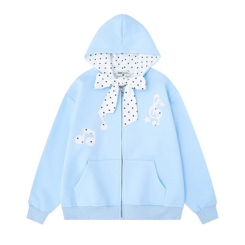 Damen Kapuzensweatjacke mit gepünktetem Kapuzenfutter, dekorativer Schleife und Notenmotiv Echoarchiv