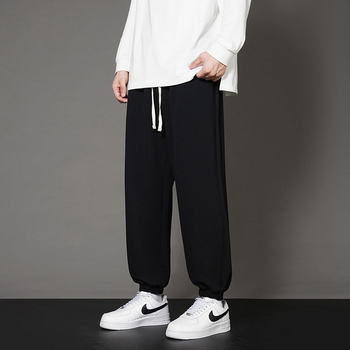 Herren Weite Relax-Jogginghose mit Kordelbund, geradem Beinverlauf & elastischen Bündchen Echoarchiv