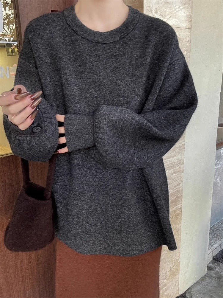 Damen Oversize-Feinstrickpullover mit Ballonärmeln und Knopfmanschette Echoarchiv