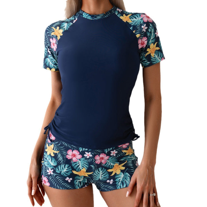 Damen Surf- und Sportanzug mit floralen Akzenten Echo Archiv