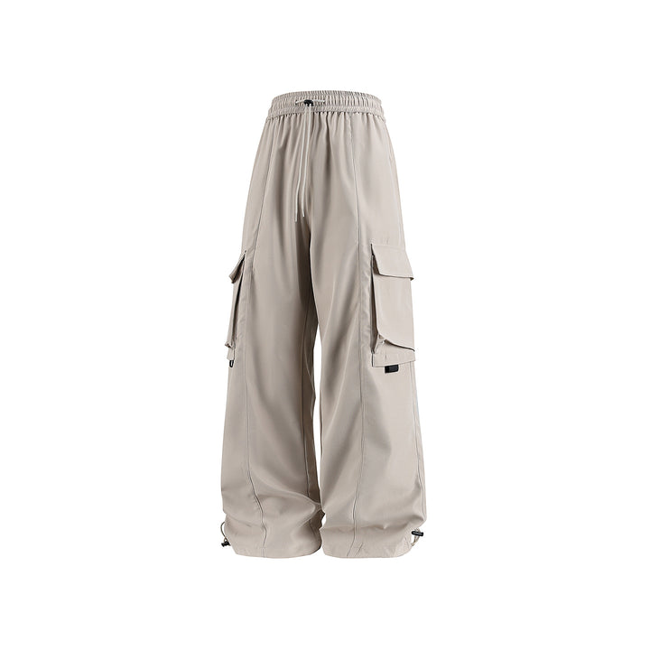 Herren weite Utility‑Cargohose im Baggy‑Cut mit Tunnelzugbund, großen Klappentaschen und verstellbarem Beinabschluss Echo Archiv