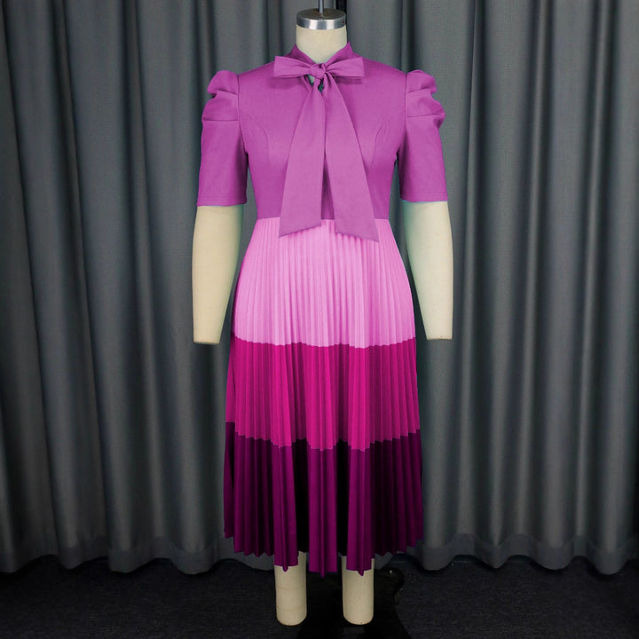 Damen Elegantes Plisseekleid mit Schleifenkragen Echo Archiv