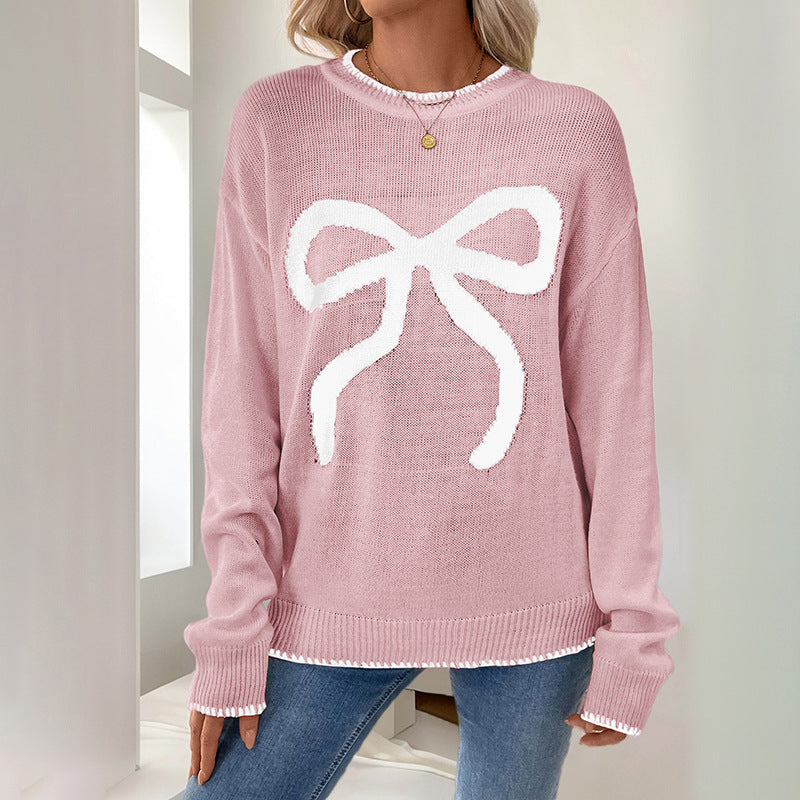 Damen Weihnachtlicher Oversize-Strickpullover mit Schleifenmotiv und gerippten Bündchen Echoarchiv