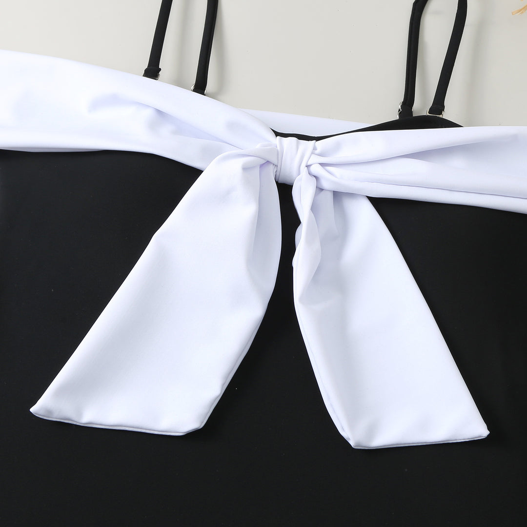 Damen Einteiler Badeanzug mit elegantem Wickel-Design und hohem Beinausschnitt Echo Archiv