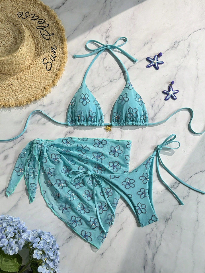 Damen blütenverzierter Bikini mit farbenfrohem Überrock Echo Archiv