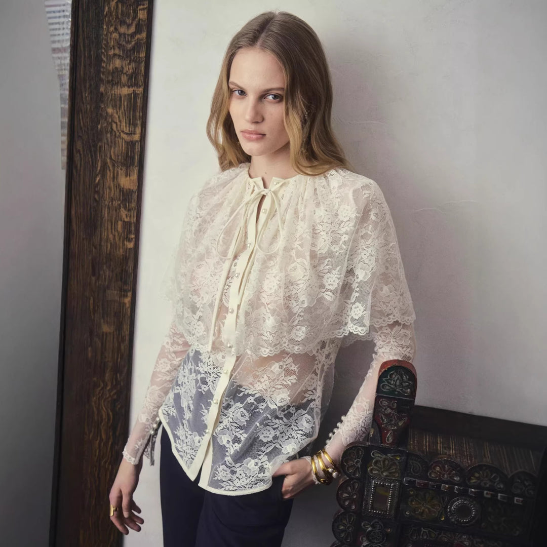 Damen Spitzenbluse mit eleganter Schleifenverzierung und transparenten Einsätzen Echo Archiv