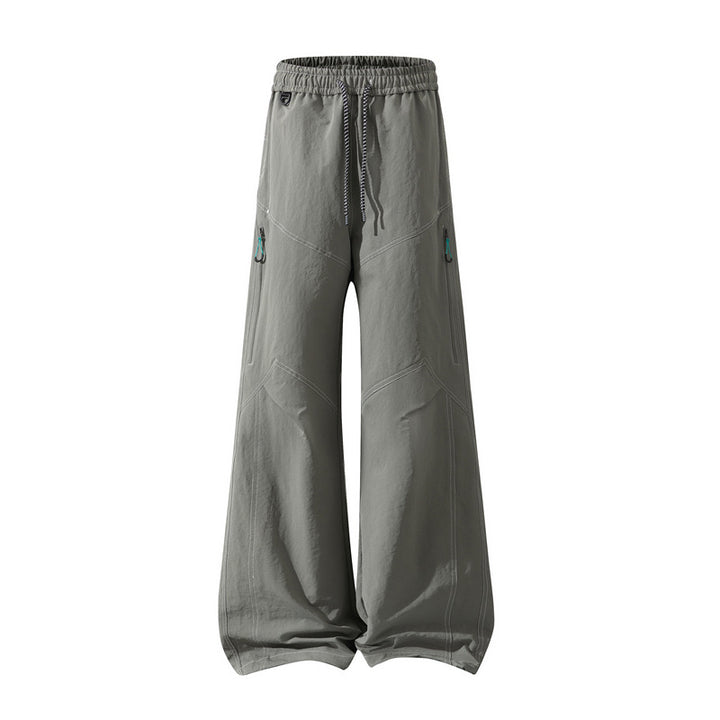 Herren Weite Cargo‑Hose mit Tunnelzugbund, Utility‑Nähten und Reißverschluss‑Taschen Echo Archiv