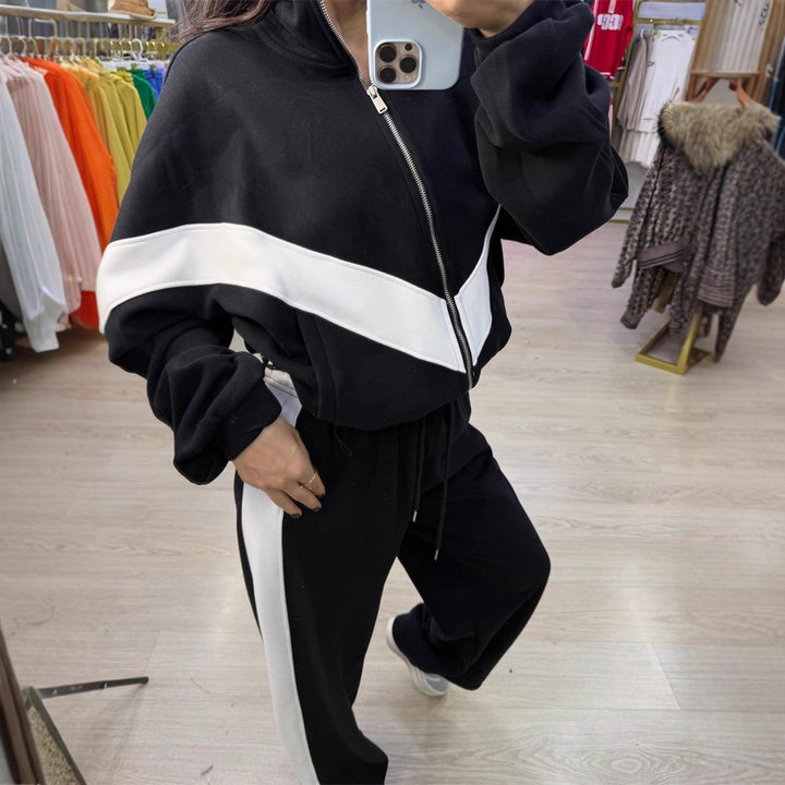 Damen eleganter sportlicher Zweiteiler Trainingsanzug mit Reißverschluss und kontrastierender V-Passe – Avérine