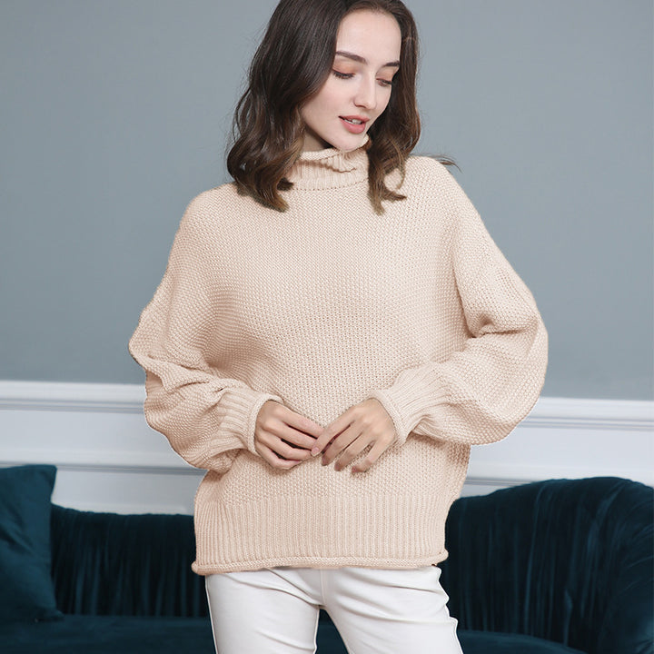 Damen Grobgestrickter Rollkragenpullover mit Ballonärmeln Echo Archiv
