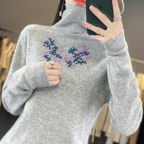 Damen Kaschmir‑Optik Rollkragenpullover mit zarter Blumenstickerei am Brustbereich Echoarchiv