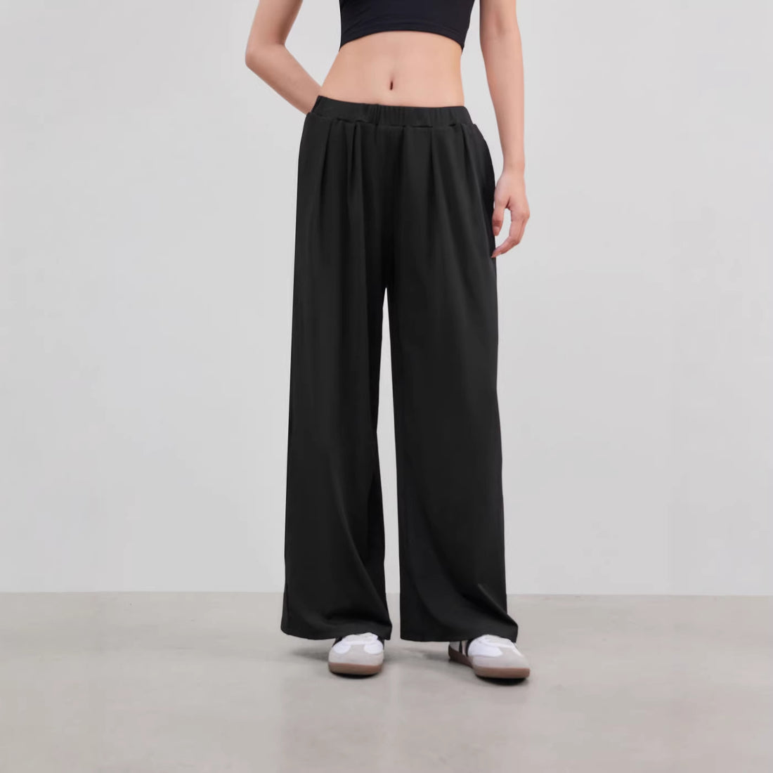 Damen Weite Palazzo-Strickhose mit hohem Elastikbund und feiner Rippstruktur – Avélisse