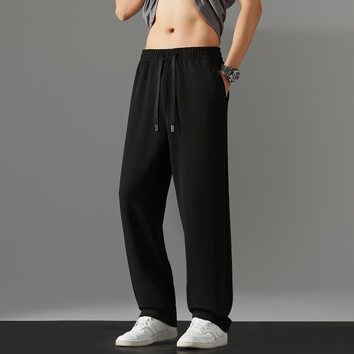 Herren weite Relaxed-Jogginghose aus French-Terry mit Kordelzug, elastischem Bund & geradem Bein Echoarchiv