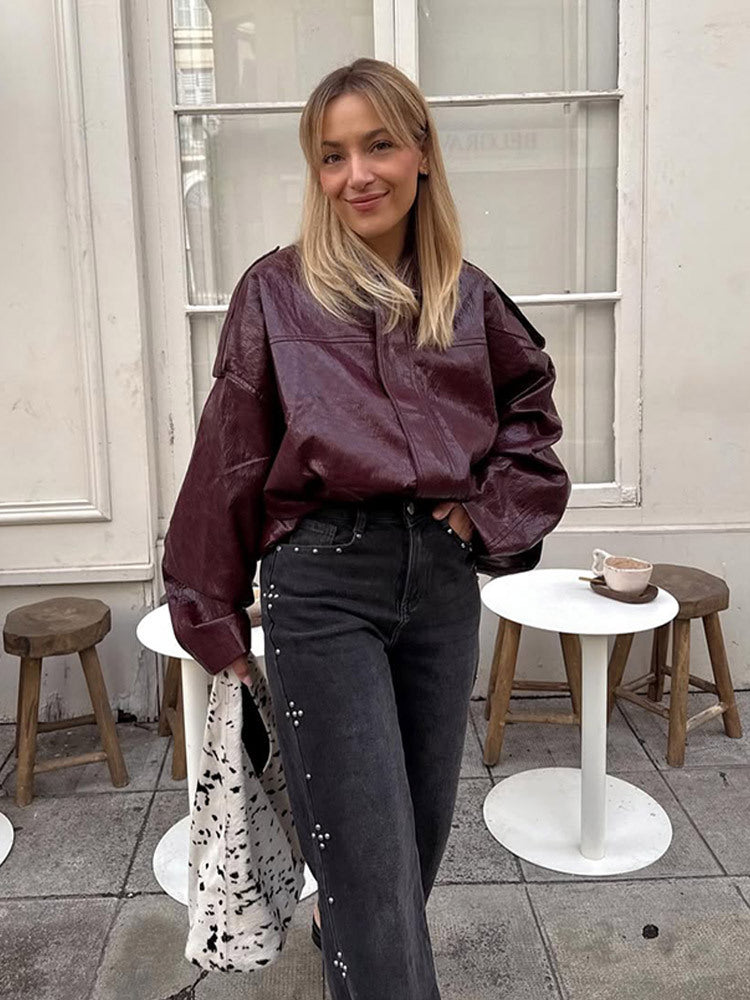 Damen Kurzblouson in glänzender Lackoptik mit Boxy‑Silhouette und überschnittenen Schultern Echoarchiv