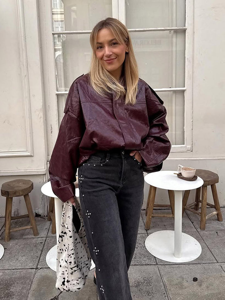 Damen Kurzblouson in glänzender Lackoptik mit Boxy‑Silhouette und überschnittenen Schultern Echoarchiv