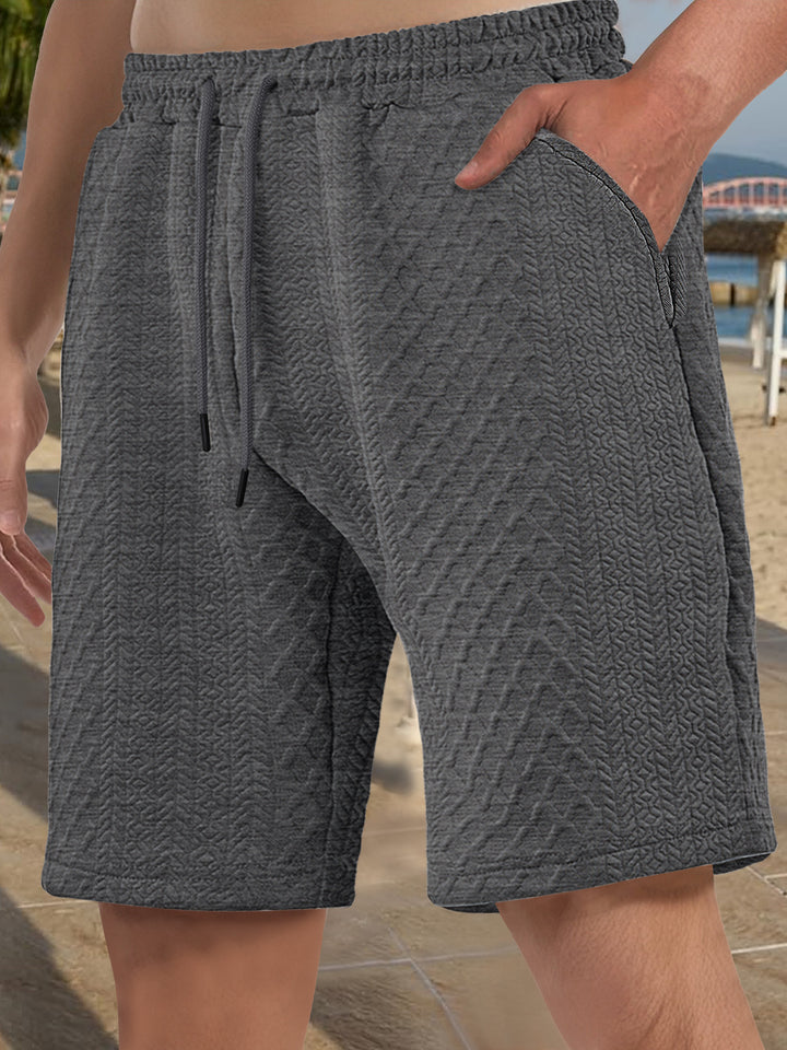 Herren nan strukturierte Strand-Bermuda aus Waffeljersey mit elastischem Kordelbund und schrägen Eingrifftaschen Echo Archiv