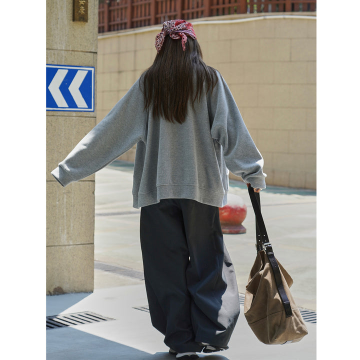 Damen Lockerer Sweatjacken-Cardigan mit Knopfleiste und Kängurutasche Echoarchiv