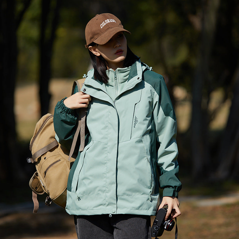 Damen zweilagige wasserabweisende Outdoorjacke mit Kapuze, Taillenregulierung und Kontrastbesätzen Echoarchiv
