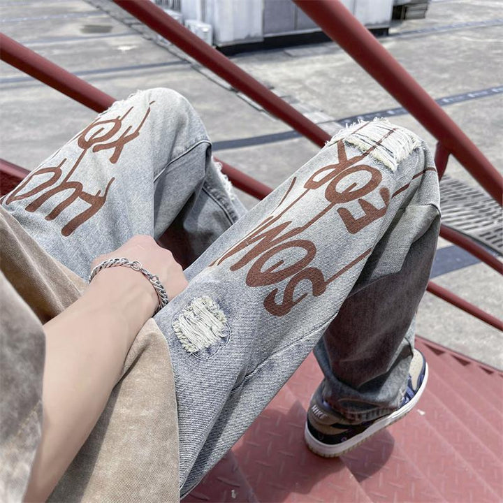 Herren Design Ripped Jeans Echoarchiv