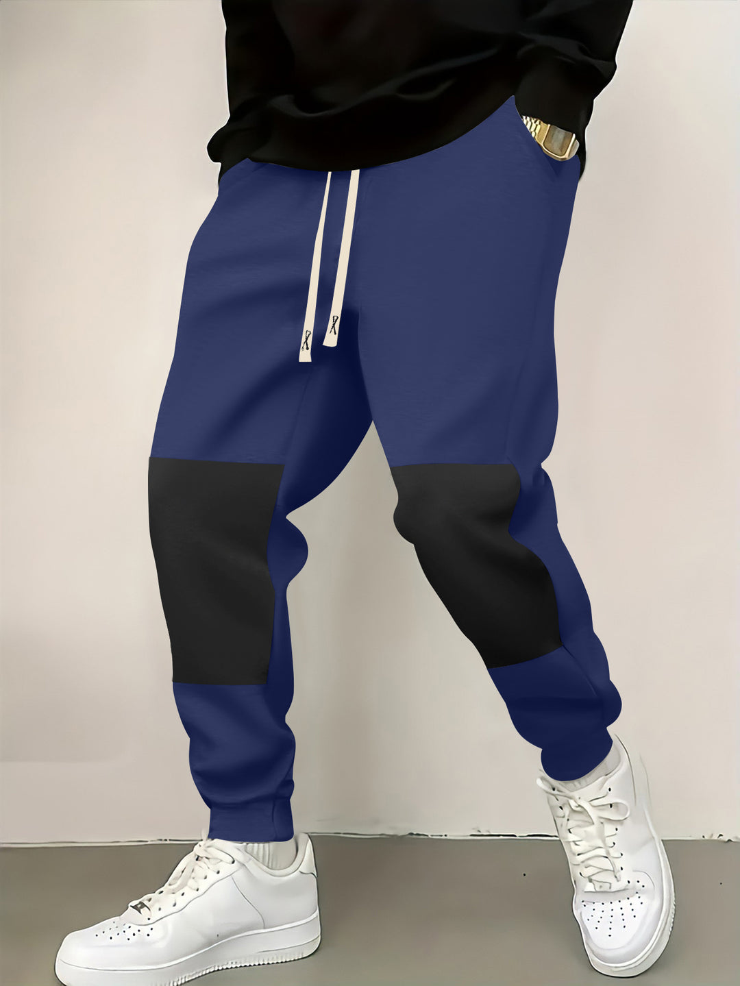 Herren elegante Sporthose mit modernen Farbblockelementen Echoarchiv