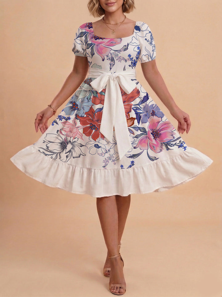 Damen Sommerliches Blumenkleid mit taillierbarem Gürtel und voluminösen Ärmeln Echo Archiv