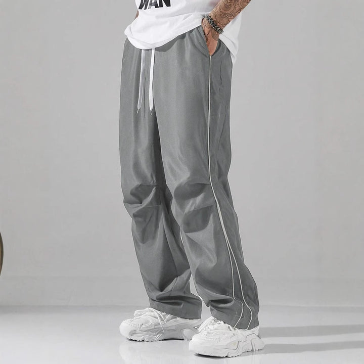 Herren Atmungsaktive Freizeithose mit seitlichem Streifen und elastischem Bund Echoarchiv