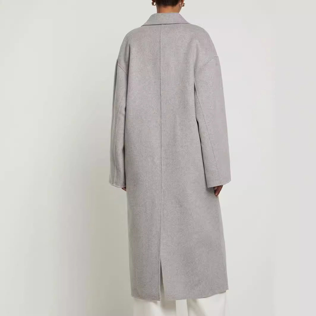 Damen Oversize Zweireihiger Longcoat mit fallender Schultersilhouette und goldenen Zierknöpfen Echoarchiv