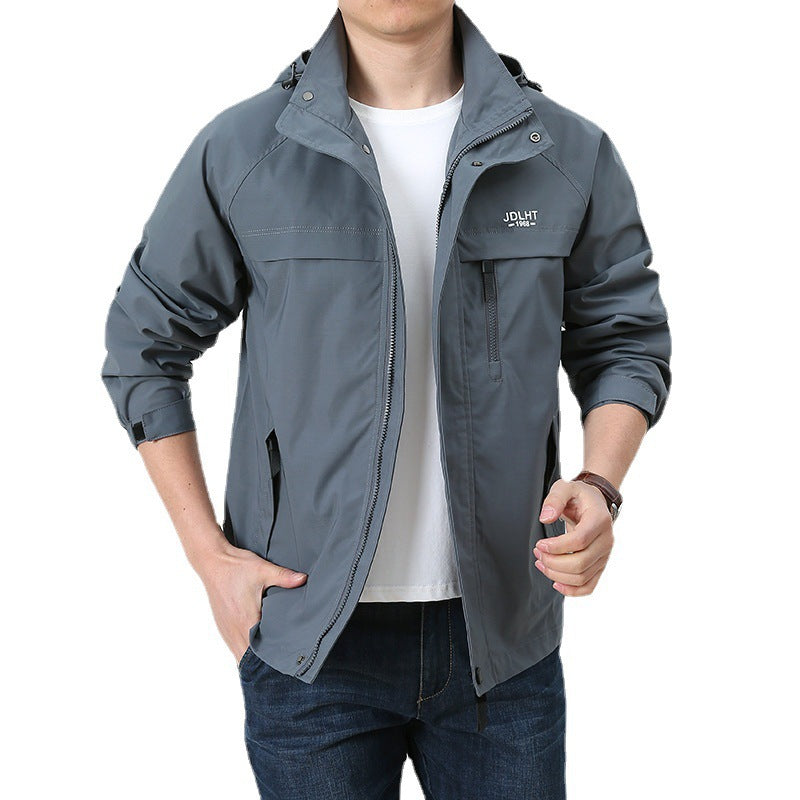 Herren Atmungsaktive Übergangs-Softshelljacke im Field‑Stil mit verdeckter Kapuze und Reißverschluss‑Brusttasche Echoarchiv
