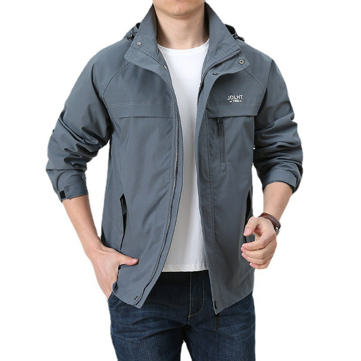 Herren Atmungsaktive Übergangs-Softshelljacke im Field‑Stil mit verdeckter Kapuze und Reißverschluss‑Brusttasche Echoarchiv