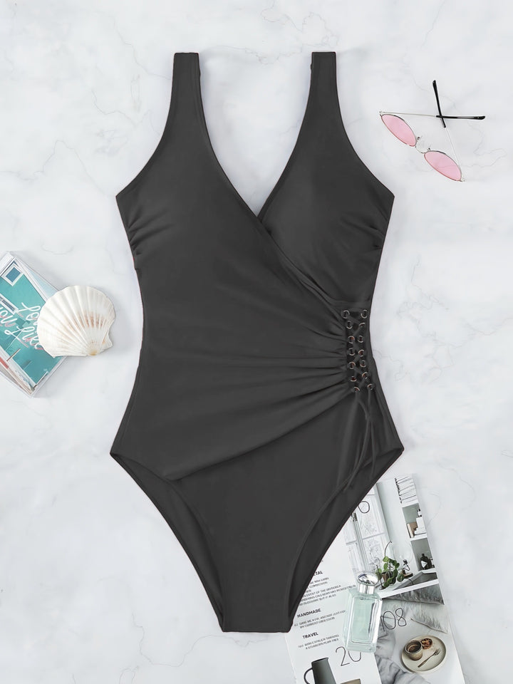 Damen Einteiliger Badeanzug mit raffiniertem Wickeldesign Echo Archiv