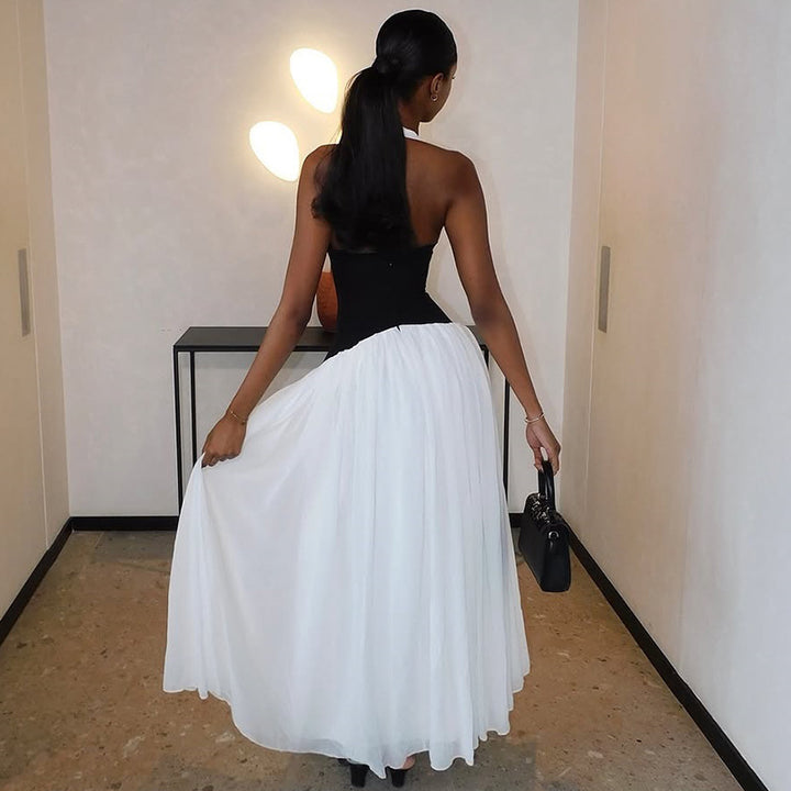 Damen Abendkleid mit tiefem V-Ausschnitt und fließendem Rock Echo Archiv