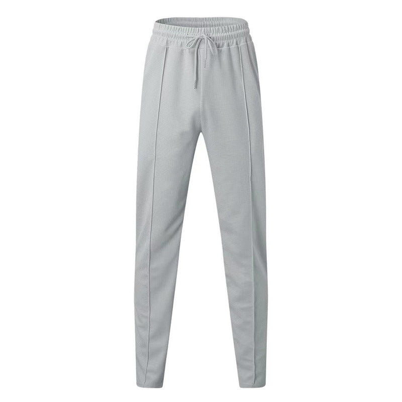 Herren nan strukturiertes Jogginghose mit elastischem Tunnelzug, formgebender Bügelfalte und tapered Bein Echo Archiv