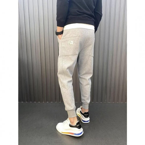 Herren Jogginghose mit tailliertem Tapered‑Schnitt, Bügelfalte und elastischen Bündchen Echoarchiv