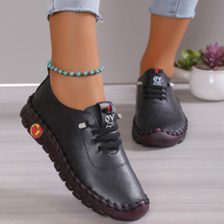 Damen Leichter, weicher Slipper mit handgenähter Gummisohle und elastischer Schnürung Echo Archiv