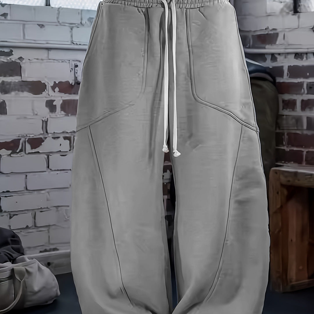 Damen Weite High‑Waist Baggy‑Jogginghose mit Tunnelzug, elastischem Bund und aufgesetzten Taschen Echoarchiv