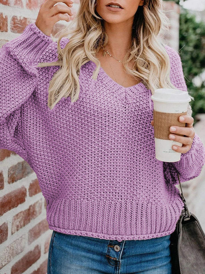 Damen Oversize Grobstrickpullover mit V-Ausschnitt und Rippsaum Echoarchiv